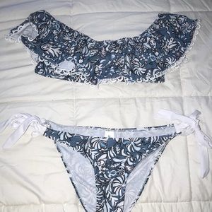 A blue, floral, off-the-shoulder bikini.